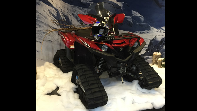 A Grizzly ATV tricked up with a Camoplast 4TS track conversion kit.