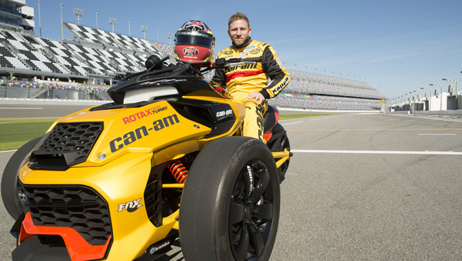 NASCAR Sprint Cup Series driver Jeffrey Earnhardt sits on the recently unveiled Can-Am Spyder F3 Turbo Concept Vehicle.