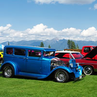 A blue classic car. 