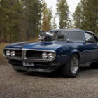 photo of a blue 1968 Firebird car. 