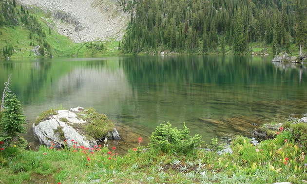 Creating awareness of the needs of the environment will help to ensure that future generations of motorized and non-motorized backcountry users will have plenty of pristine wilderness areas to enjoy. Scenic shot of an alpine lake.