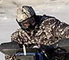 Man on ATV in winter