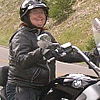 lady riding a bike on the highway