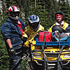 people ATVing in the mountains