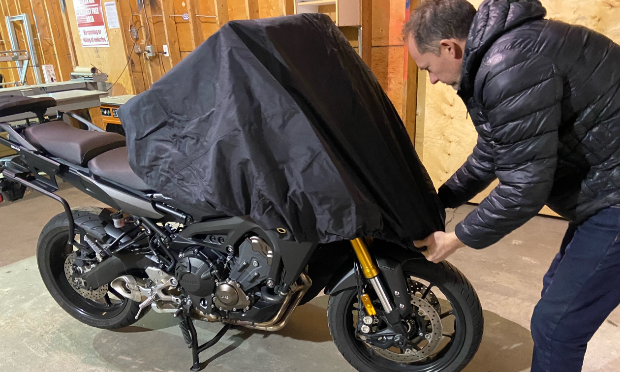Phil Budiselich instals the Badass Moto Ultimate All Wx Waterproof Motorcycle Cover onto his 2015 Yamaha FJ-09 motorcycle.