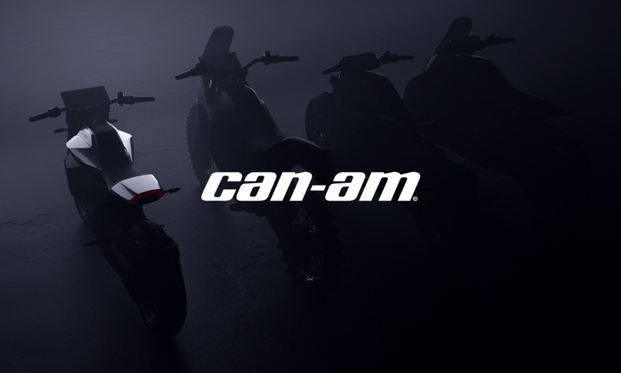 Can-Am written in white on a black background with silhouettes of motorcycles. 