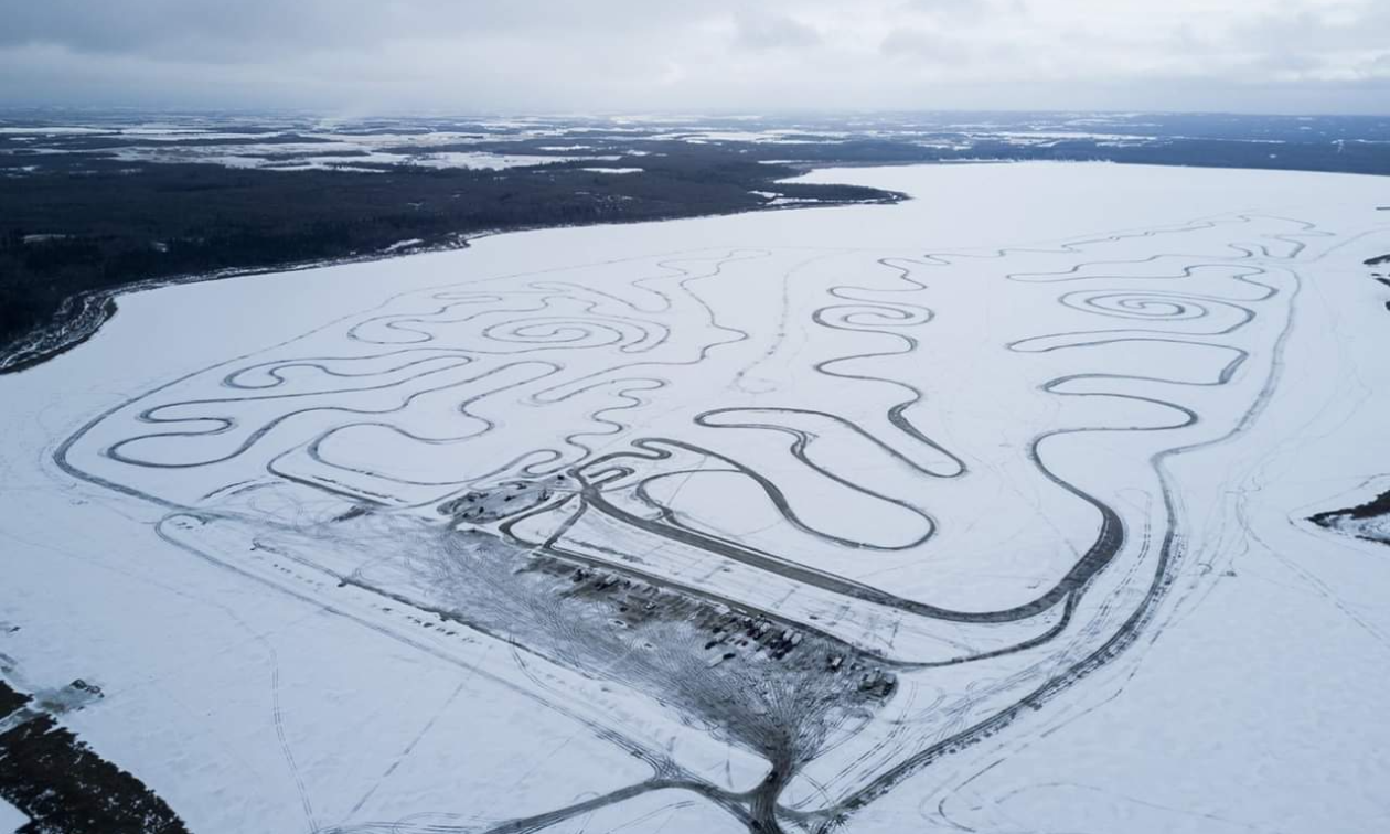A top-down look at a groomed ice race track. 