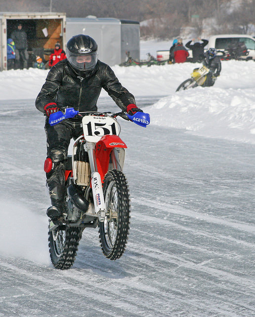 Devin Edio speeding down the ice racing track.