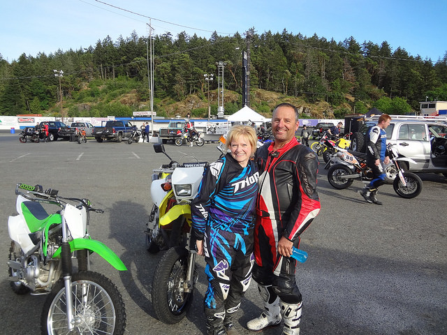 Corrine Laycock with her boyfriend, James, standing next to their motorbikes. 
