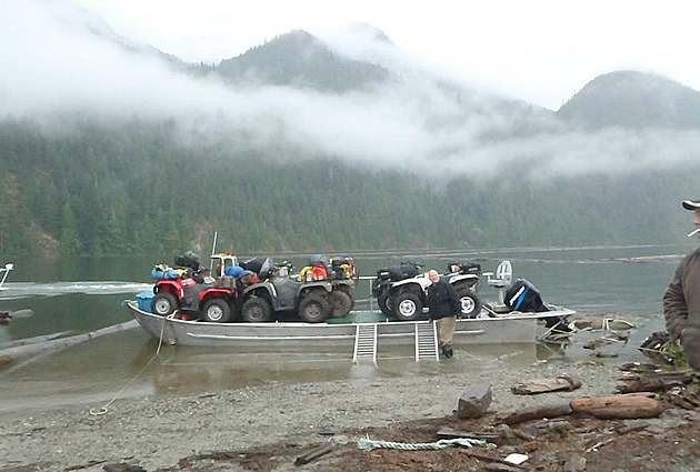 A group of ATVs on a boat. 