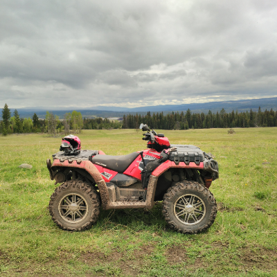 An ATV on grassland.

