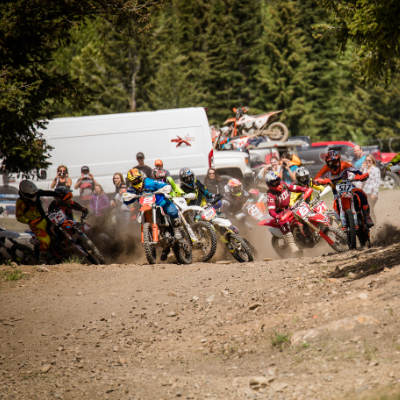 The Panorama Hare Scramble sees many riders competing for positioning in tight confines.
