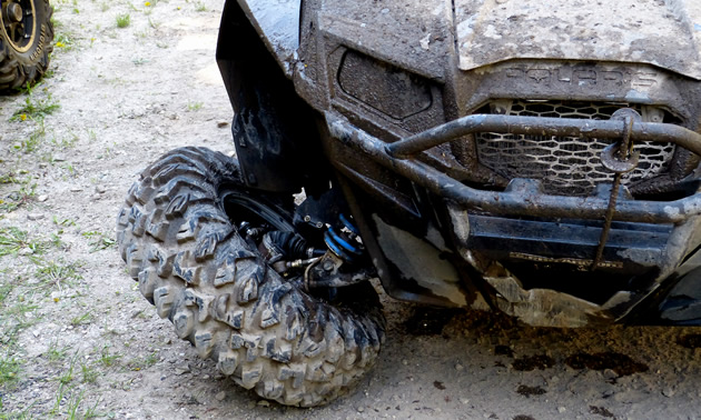 A SxS with a busted wheel. 