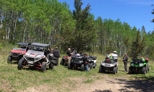 Woodridge Sandhogs have their ATVs parked trailside while out on a local ride.