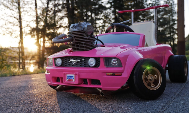 A pink Power Wheels Barbie Mustang with a BR VZ21 mini turbo charger.