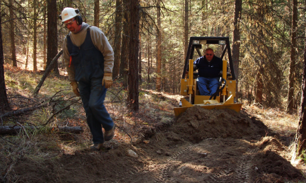 Mini bulldozers pave the way for new trails at the Bear Creek Recreation Site.