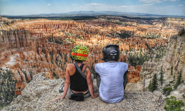 Kevin Chow sits beside his girlfriend, Claire Newbolt, in Bryce Canyon in Utah.
