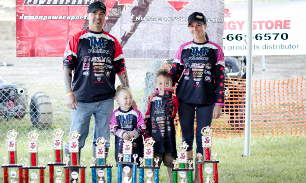 (L to R) Bill, Brook, Damon and April Ford are one big happy mud-racing family.