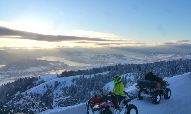 An ATV and rider look out over the horizon