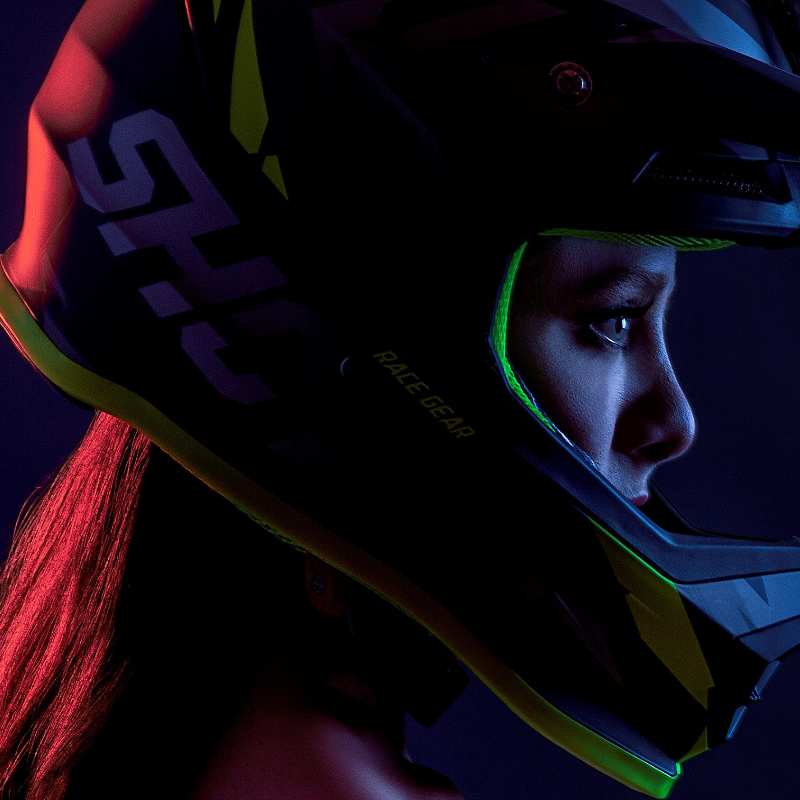 Wide Open Podcast logo shows Kela Louise wearing a dirt bike helmet in front of a black background.