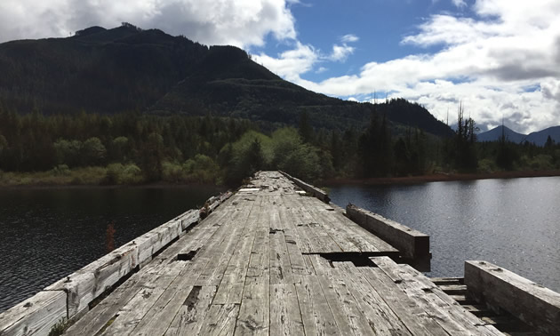 The Old Clayoquot Bridge shows damage from logging protests in 1993. 