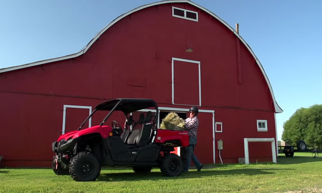 Darryl Sutter on his farm with the Yamaha Viking side by side