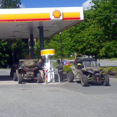 A group of UTVers fueling up at a Shell station. 
