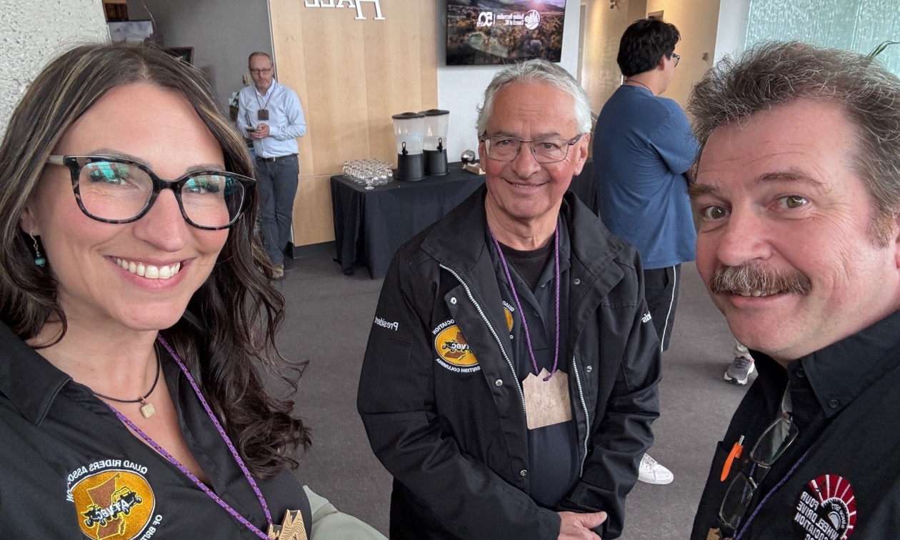 Kirstin and two men standing together wearing ATVBC jackets
