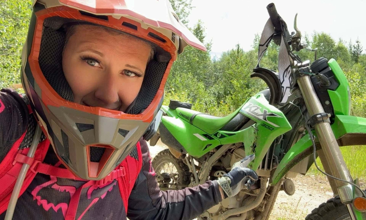 Cindy Young on a motorcycle looking into the camera