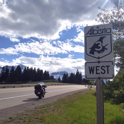 A motorcycle parked along the Crowsnest Highway 3 in Crowsnest Pass, Alberta. 