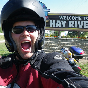 Jeff Lee and his faithful riding buddy, Homer, are excited to arrive at Hay River.