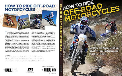 Photo of the cover a book with a guy on a motorcycle riding towards the viewer. 