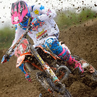 Kaven Benoit banking into a corner on his KTM. 