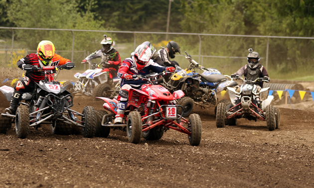 Luc Gagnon leads a pack of ATV racers. 