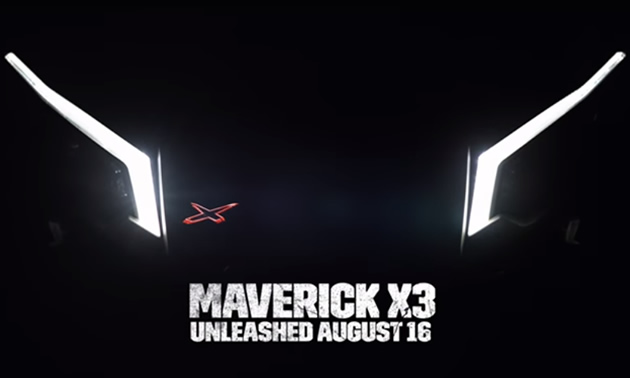 Screen capture of Maverick X3 trailer, showing headlights against black blackground, with words 'Maverick X3 - Unleashed August 16th'