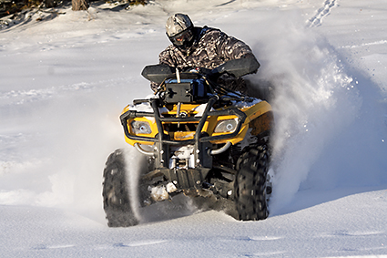 Man on ATV in winter