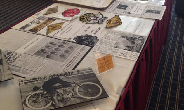 Manitoba Motorcycle Club memorabilia is on a table display at the Canadian Motorcycle Hall of Fame 2014 inductee awards banquet.