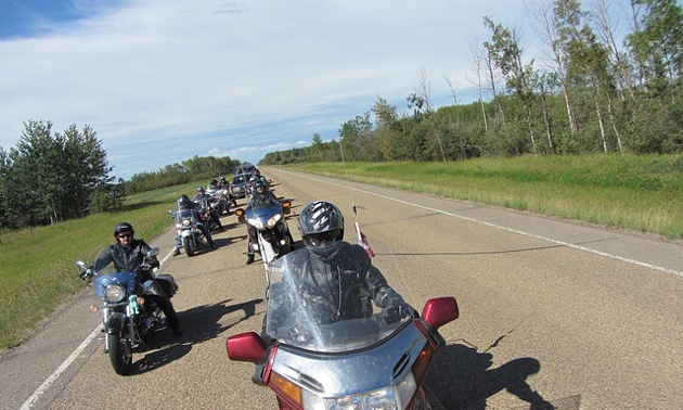 Members of the Mackenzie Highway Motorcycle Association  enjoy a ride on the High Level Circle Tour.
