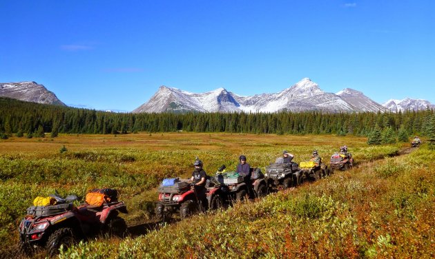 The crew from the Moose ATV Club took visitors from Vancouver on a challenging adventure to experience the awesomeness of the spectacular and challenging Onion lake trail. This photo was captured in the beautiful little meadow on the far end of the trail after dropping into the valley from the high alpine. Location: Northern BC, South-East of Tumbler Ridge BC. 