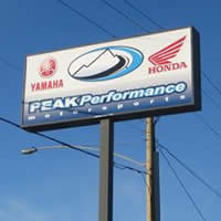 The store sign for Peak Performance Motorsports. 