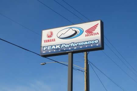 The store sign for Peak Performance Motorsports. 