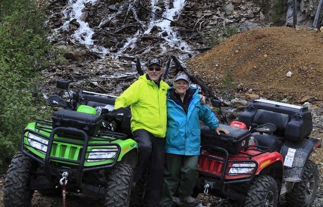 Doug Williamson and Val Traverse with their Arctic Cat TRVs at the Estella Mine.