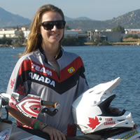 Shelby Turner and her bike in front of a lake in Italy. 