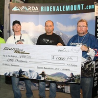 Curtis Pawliuk William Chitty Ron Willert and Murray McKay holding a cheque that snowandmud is presenting to VARDA.