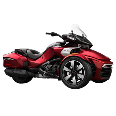 A red Spyder F3 bagger with windshield and built-in saddlebags. 