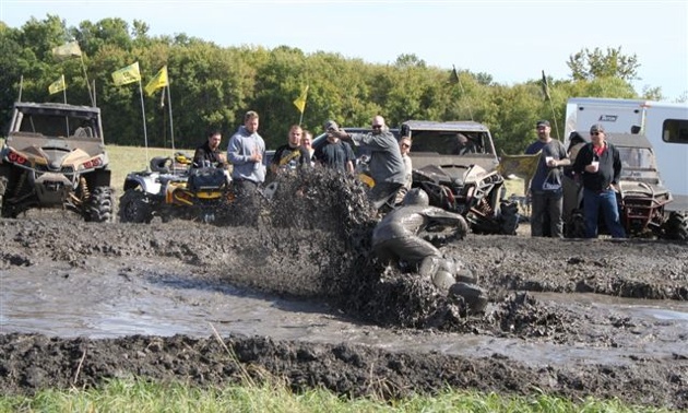 Rider JP Mack giving it his all in the muddy event grounds of the St Jean Derby. 