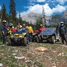 People ATVing in the mountains