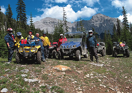 People ATVing in the mountains