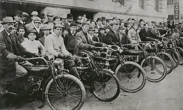 Motorcycles and their riders are lined up for the Manitoba Motorcycle Club's first official run, way back in 1911.