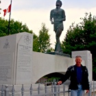 Man in front of terry Fox memorial